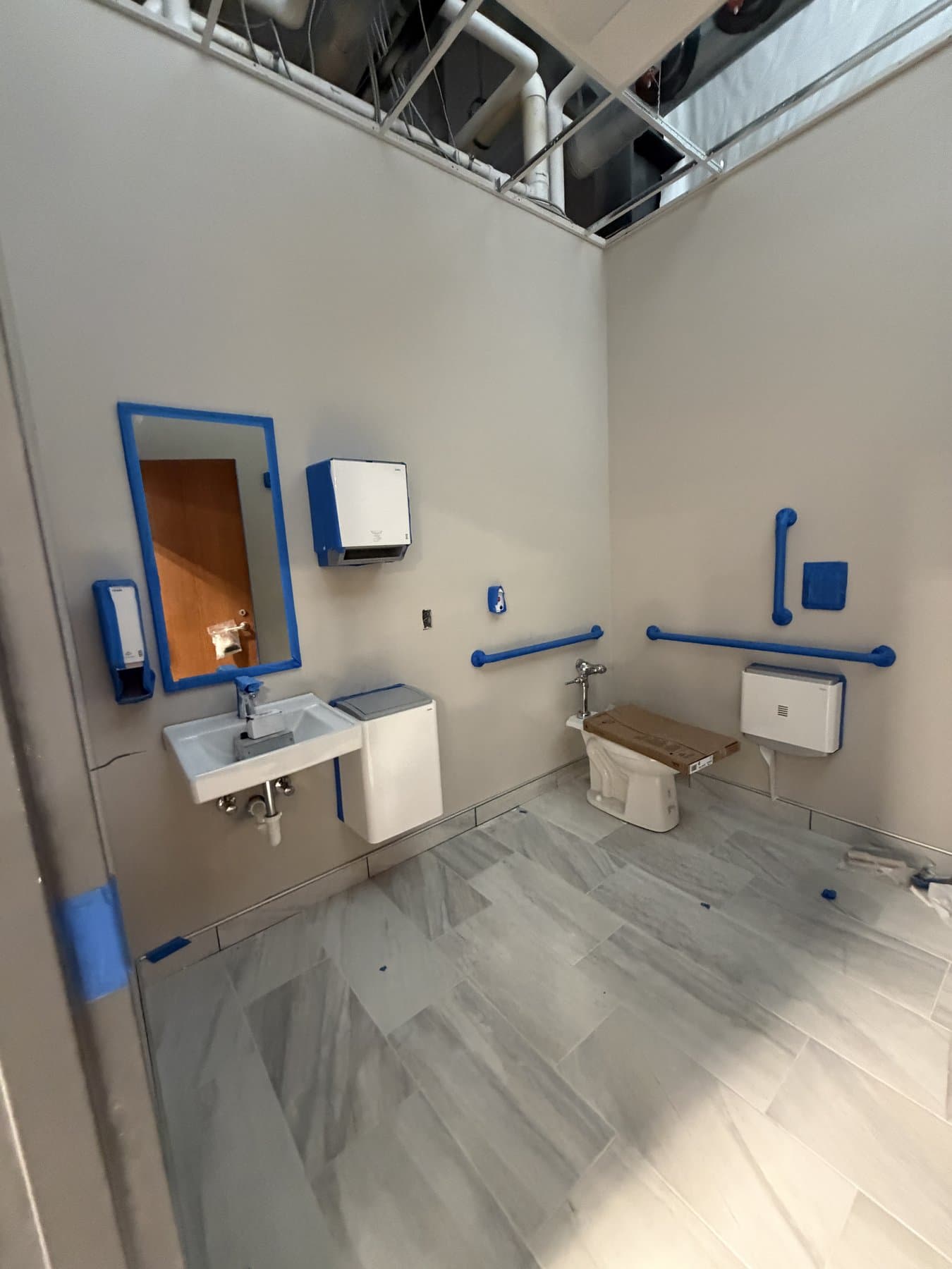 Accessible restroom with grab bars
